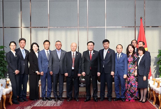 Le president de l’Assemblee nationale Vuong Dinh Hue rencontre des dirigeants de grands groupes chinois hinh anh 2