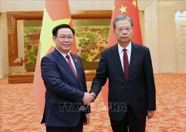 La visite du president de l'AN Vuong Dinh Hue apporte une contribution pratique aux relations Vietnam-Chine hinh anh 1