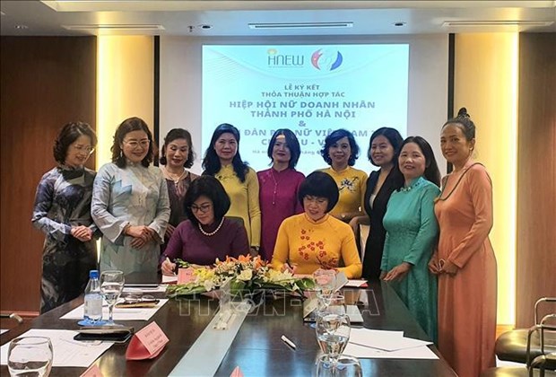 Cooperation pour rehausser la position et les contributions des femmes vietnamiennes hinh anh 1