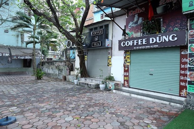Coronavirus : Hanoi ferme les restaurants et les cafes sur les trottoirs hinh anh 7