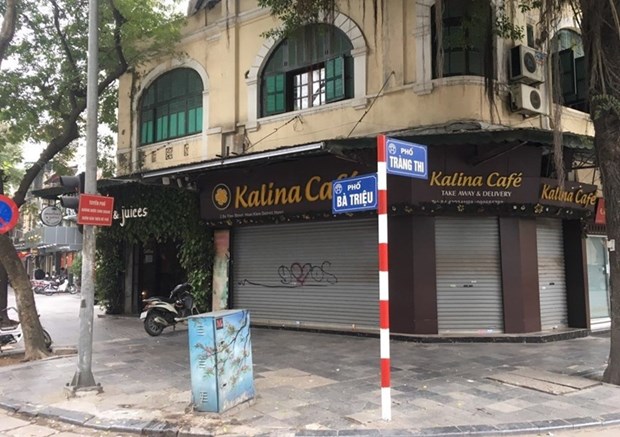 Coronavirus : Hanoi ferme les restaurants et les cafes sur les trottoirs hinh anh 6