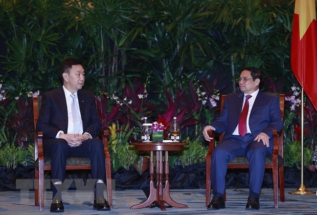 Le Premier ministre Pham Minh Chinh parle business a Singapour hinh anh 4