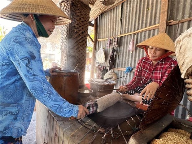 Le metier de fabrication de banh trang de Thuan Hung devient patrimoine culturel immateriel hinh anh 1